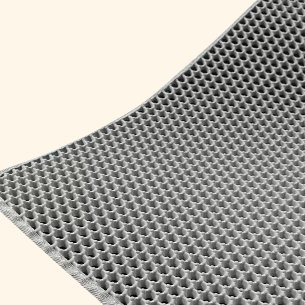 Tapis de litière innovant gris